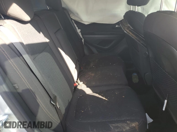 2020 Chevrolet Trax LS z VIN KL7CJKSB1LB312743, wystawiony jako Copart lot #52165565 z przebiegiem Nie podano mil oraz Szkoda całkowita • Salvage title. Historia ofert i sprzedaży dostępna na DreamBid. Obrazek 10.