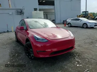 2022 Tesla Model Y Performance with VIN 7SAYGDEF6NF337996, listed as a Copart auction lot 56039515 with 16,468 mi miles and Salvage title. Bid and sale history available at DreamBid. Image 26.