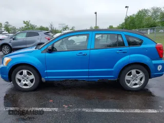 2009 Dodge Caliber SXT z VIN 1B3HB48A39D163685, wystawiony jako IAAI lot #42193202 z przebiegiem 97 479 mil mil oraz . Historia ofert i sprzedaży dostępna na DreamBid. Obrazek 14.