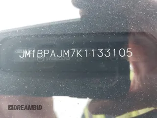 2019 Mazda 3 z VIN JM1BPAJM7K1133105, wystawiony jako IAAI lot #42473214 z przebiegiem 47 751 mil mil oraz . Historia ofert i sprzedaży dostępna na DreamBid. Obrazek 9.