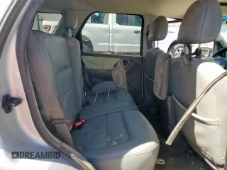 2005 Ford Escape Hybrid z VIN 1FMCU96H75KB95718, wystawiony jako Copart lot #60000825 z przebiegiem Nie podano mil oraz Czysty tytuł • Clean title. Historia ofert i sprzedaży dostępna na DreamBid. Obrazek 11.
