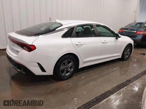 2023 Kia K5 LXS z VIN 5XXG14J2XPG189462, wystawiony jako IAAI lot #42233595 z przebiegiem 17 286 mil mil oraz . Historia ofert i sprzedaży dostępna na DreamBid. Obrazek 4.