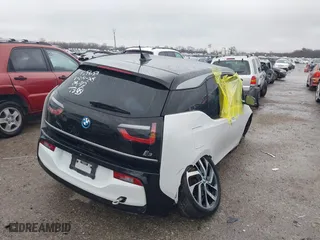 2019 BMW i3 with VIN WBY8P2C59K7D97415, listed as a IAAI auction lot 41509553 with 58,083 mi miles. Bid and sale history available at carsss.com. Image 4.