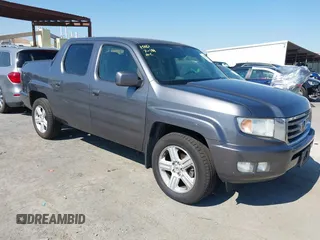 2014 Honda Ridgeline RTL with VIN 5FPYK1F53EB001939, listed as a IAAI auction lot 42725509 with 198,754 mi miles and . Bid and sale history available at DreamBid. Image 1.