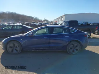 2018 Tesla Model 3 Long Range Battery with VIN 5YJ3E1EA0JF037736, listed as a IAAI auction lot 41423506 with 23,675 mi miles and . Bid and sale history available at DreamBid. Image 13.