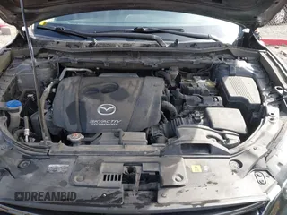 2016 Mazda CX-5 Touring with VIN JM3KE4CY9G0915305, listed as a IAAI auction lot 41840519 with 188,702 mi miles and . Bid and sale history available at carsss.com. Image 10.