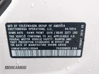2013 Volkswagen Passat Wolfsburg Edition with VIN 1VWAP7A39DC132046, listed as a IAAI auction lot 41829115 with 122,660 mi miles. Bid and sale history available at carsss.com. Image 9.