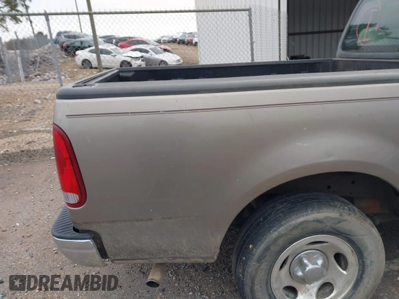 2002 Ford F-150 XL with VIN 3FTRF17212MA23970, listed as a IAAI auction lot 40991449 with 216,487 mi miles. Bid and sale history available at carsss.com. Image 14.