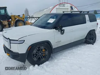 2023 Rivian R1S Adventure z VIN 7PDSGABA9PN015327, wystawiony jako IAAI lot #41484133 z przebiegiem Nie podano mil oraz . Historia ofert i sprzedaży dostępna na DreamBid. Obrazek 18.