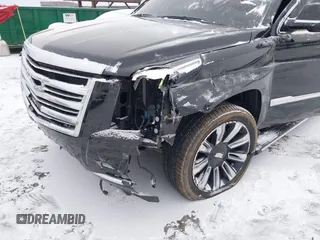 2015 Cadillac Escalade ESV Platinum z VIN 1GYS4UKJ0FR746571, wystawiony jako IAAI lot #38461309 z przebiegiem 65 724 mil mil oraz . Historia ofert i sprzedaży dostępna na DreamBid. Obrazek 6.