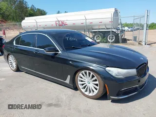 2016 BMW 7 Series 740i with VIN WBA7E2C55GG547752, listed as a IAAI auction lot 41992704 with Not Provided miles. Bid and sale history available at carsss.com. Image 1.