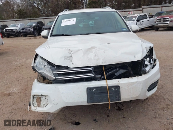 2017 Volkswagen Tiguan Wolfsburg Edition with VIN WVGRV7AX5HK019734, listed as a IAAI auction lot 41391911 with 123,005 mi miles and . Bid and sale history available at DreamBid. Image 12.