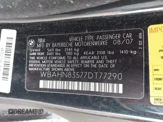 2007 BMW 7 Series 750Li with VIN WBAHN83577DT77290, listed as a IAAI auction lot 41908957 with 164,215 mi miles. Bid and sale history available at carsss.com. Image 9.