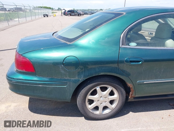 2000 Mercury Sable LS Premium z VIN 1MEFM55S4YA648211, wystawiony jako IAAI lot #42354578 z przebiegiem 72 686 mil mil oraz . Historia ofert i sprzedaży dostępna na DreamBid. Obrazek 6.
