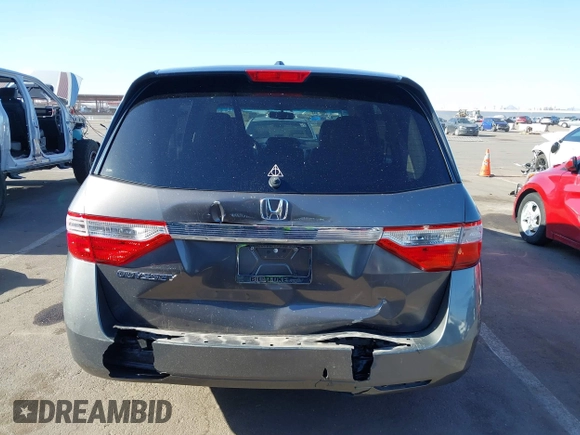 2011 Honda Odyssey EX-L with VIN 5FNRL5H6XBB083980, listed as a IAAI auction lot 42100308 with 191,361 mi miles and . Bid and sale history available at carsss.com. Image 6.