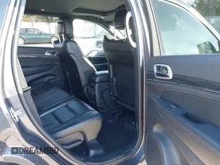 2021 Jeep Grand Cherokee 80th Anniversary z VIN 1C4RJFBG5MC737412, wystawiony jako IAAI lot #41753550 z przebiegiem 54 921 mil mil oraz . Historia ofert i sprzedaży dostępna na DreamBid. Obrazek 8.