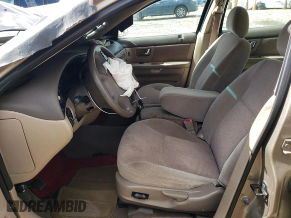 2002 Ford Taurus SES Standard with VIN 1FAFP55242A259784, listed as a Copart auction lot 76028114 with 90,079 mi miles and Clean Title. Bid and sale history available at DreamBid. Image 7.