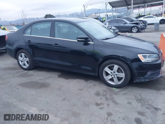 2013 Volkswagen Jetta TDI w/Premium/Nav with VIN 3VWLL7AJ4DM248448, listed as a IAAI auction lot 41749189 with 85,933 mi miles and . Bid and sale history available at DreamBid. Image 1.