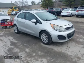 2012 Kia Rio LX with VIN KNADM5A36C6040934, listed as a IAAI auction lot 41970914 with 121,405 mi miles. Bid and sale history available at carsss.com. Image 1.