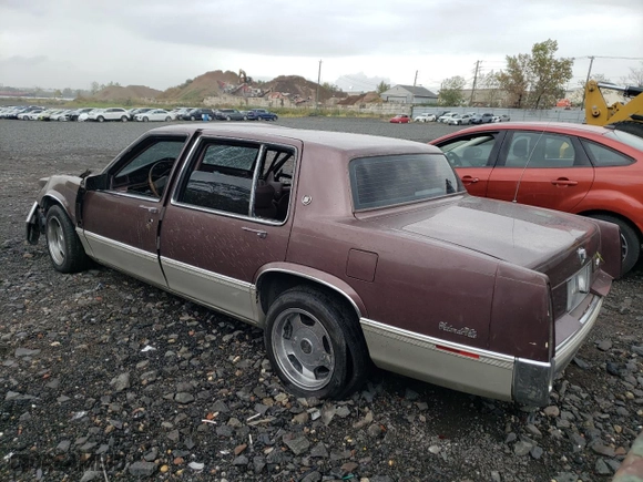 1989 Cadillac DeVille with VIN 1G6CD5157K4371390, listed as a Copart auction lot 72955004 with NaN miles and Salvage Title. Bid and sale history available at carsss.com. Image 2.