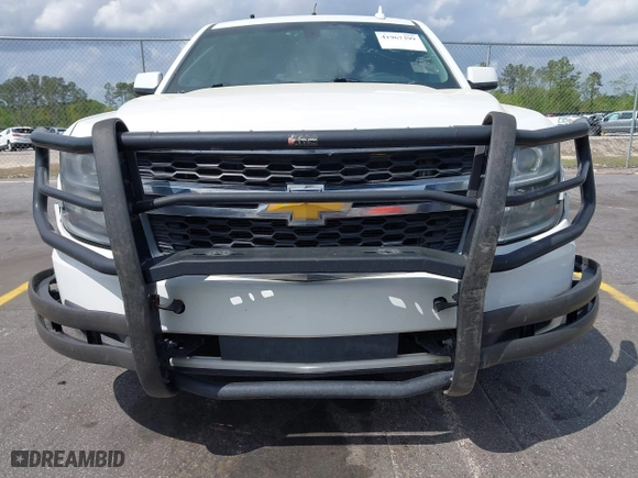2016 Chevrolet Tahoe Commercial with VIN 1GNLCDEC5GR423300, listed as a IAAI auction lot 41967399 with 147,429 mi miles. Bid and sale history available at carsss.com. Image 6.