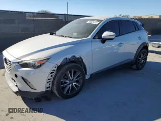 2018 Mazda CX-3 Touring with VIN JM1DKDC77J0305749, listed as a Copart auction lot 86524474 with 112,562 mi miles and Salvage Title. Bid and sale history available at DreamBid. Image 1.