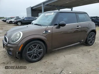 2011 MINI Hardtop with VIN WMWSU3C57BT097931, listed as a Copart auction lot 58793665 with 105,793 mi miles and Salvage title. Bid and sale history available at DreamBid. Image 1.
