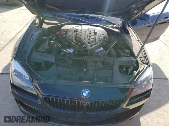 2012 BMW 6 Series 650i z VIN WBALZ3C51CDL72422, wystawiony jako Copart lot #87447914 z przebiegiem 115 376 mil mil oraz Szkody całkowita. Historia ofert i sprzedaży dostępna na DreamBid. Obrazek 11.