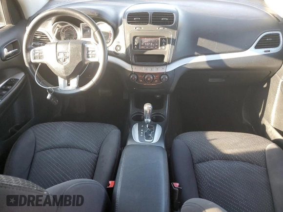 2013 Dodge Journey SXT with VIN 3C4PDCBG0DT522408, listed as a Copart auction lot 62699195 with 130,665 mi miles and Salvage title. Bid and sale history available at DreamBid. Image 8.