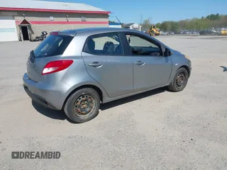 2012 Mazda 2 Sport with VIN JM1DE1KY1C0142339, listed as a IAAI auction lot 42227688 with 259,568 mi miles and . Bid and sale history available at DreamBid. Image 4.
