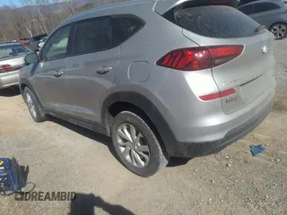 2021 Hyundai Tucson Value with VIN KM8J33A45MU393874, listed as a IAAI auction lot 41681171 with 79,164 mi miles and . Bid and sale history available at DreamBid. Image 3.