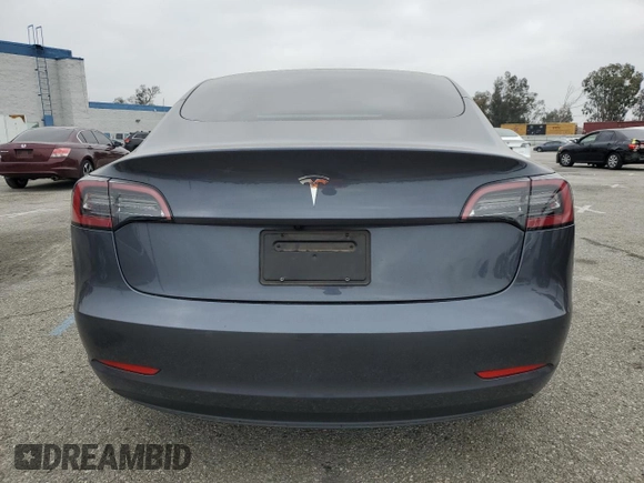 2023 Tesla Model 3 with VIN 5YJ3E1EA4PF642769, listed as a Copart auction lot 50648825 with 25,310 mi miles and Salvage title. Bid and sale history available at DreamBid. Image 6.