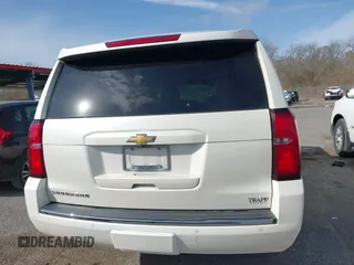 2015 Chevrolet Suburban LTZ with VIN 1GNSCKKC2FR741040, listed as a IAAI auction lot 41709574 with 87,795 mi miles and . Bid and sale history available at DreamBid. Image 16.