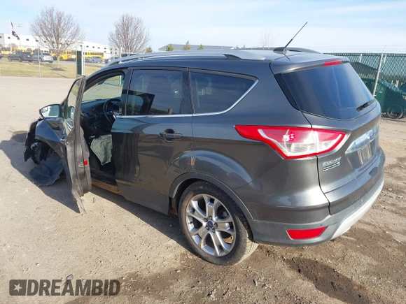 2015 Ford Escape Titanium with VIN 1FMCU9J90FUB58306, listed as a IAAI auction lot 41815151 with 136,835 mi miles. Bid and sale history available at carsss.com. Image 3.