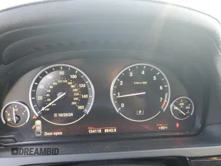 2011 BMW 7 Series 740i with VIN WBAKA4C55BC612987, listed as a Copart auction lot 76607654 with 154,118 mi miles and Salvage Title. Bid and sale history available at carsss.com. Image 9.