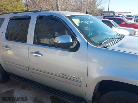 2013 Chevrolet Suburban LT with VIN 1GNSCJE00DR266075, listed as a IAAI auction lot 41338826 with 291,358 mi miles. Bid and sale history available at carsss.com. Image 14.