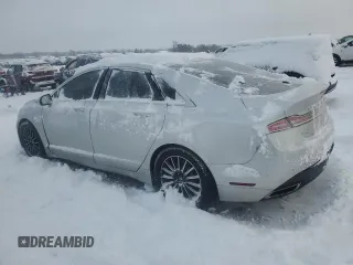 2015 Lincoln MKZ z VIN 3LN6L2JK7FR608177, wystawiony jako Copart lot #85162384 z przebiegiem Nie podano mil oraz Czysty tytuł • Clean title. Historia ofert i sprzedaży dostępna na DreamBid. Obrazek 2.