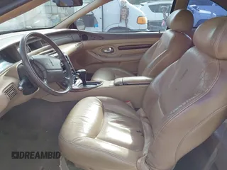 1997 Lincoln Mark VIII with VIN 1LNLM91V9VY637988, listed as a IAAI auction lot 41980611 with 151,121 mi miles and . Bid and sale history available at DreamBid. Image 5.