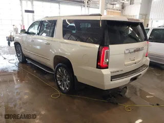 2015 GMC Yukon XL Denali with VIN 1GKS2JKJXFR528927, listed as a IAAI auction lot 41391259 with 159,467 mi miles. Bid and sale history available at carsss.com. Image 3.
