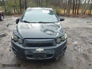 2014 Chevrolet Sonic LT with VIN 1G1JC5SH8E4234634, listed as a IAAI auction lot 41464054 with 117,113 mi miles. Bid and sale history available at carsss.com. Image 13.