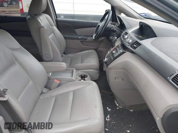 2011 Honda Odyssey EX-L with VIN 5FNRL5H64BB085479, listed as a IAAI auction lot 42404637 with 185,624 mi miles and . Bid and sale history available at DreamBid. Image 5.