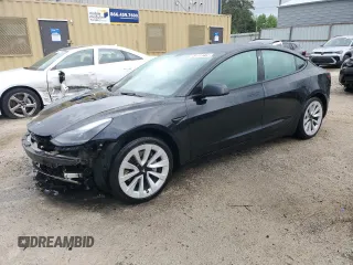 2022 Tesla Model 3 with VIN 5YJ3E1EA0NF372095, listed as a Copart auction lot 54958215 with 148,441 mi miles and Clean Title. Bid and sale history available at DreamBid. Image 1.