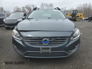 2015 Volvo V60 z VIN YV126MEA6F1206906, wystawiony jako Copart lot #51837425 z przebiegiem 142 194 mil mil oraz Tytuł czysty. Historia ofert i sprzedaży dostępna na DreamBid. Obrazek 5.