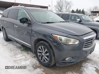 2014 Infiniti QX60 with VIN 5N1AL0MM1EC517477, listed as a IAAI auction lot 41333125 with 136,584 mi miles. Bid and sale history available at carsss.com. Image 1.