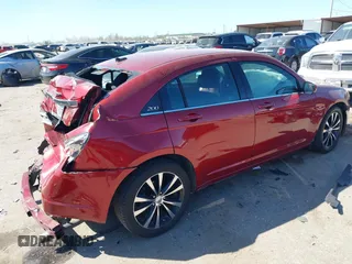 2014 Chrysler 200 Touring z VIN 1C3CCBBG4EN187283, wystawiony jako IAAI lot #41735592 z przebiegiem 141 289 mil mil oraz . Historia ofert i sprzedaży dostępna na DreamBid. Obrazek 4.
