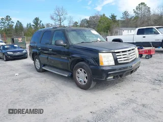 2003 Cadillac Escalade z VIN 1GYEC63T03R170763, wystawiony jako IAAI lot #41651319 z przebiegiem 470 161 mil mil oraz . Historia ofert i sprzedaży dostępna na DreamBid. Obrazek 1.