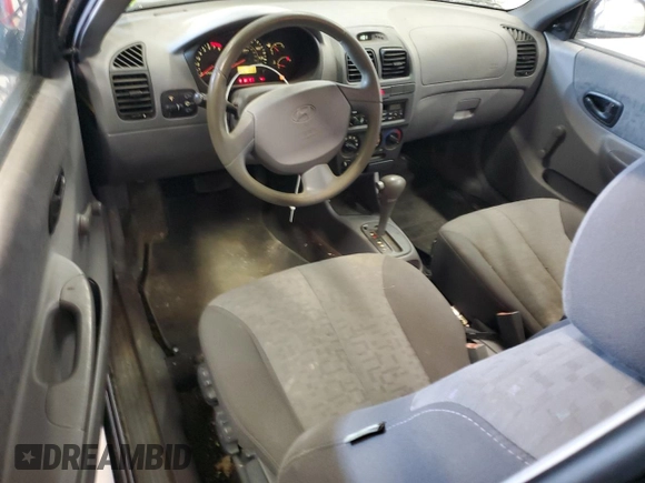 2005 Hyundai Accent GLS with VIN KMHCG35C95U327960, listed as a Copart auction lot 77151314 with 101,556 mi miles and Clean Title. Bid and sale history available at carsss.com. Image 8.