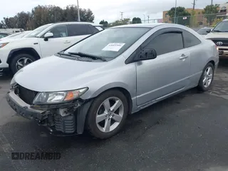 2009 Honda Civic Cpe LX with VIN 2HGFG12669H524342, listed as a IAAI auction lot 42061391 with 162,369 mi miles. Bid and sale history available at carsss.com. Image 2.