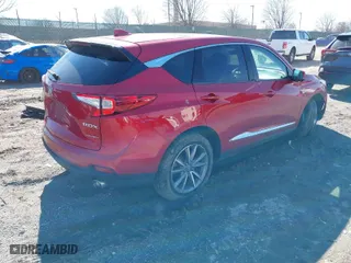 2019 Acura RDX w/Technology Pkg with VIN 5J8TC2H54KL013305, listed as a IAAI auction lot 41748901 with 63,439 mi miles. Bid and sale history available at carsss.com. Image 4.