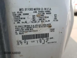 2003 Ford F-350 z VIN 1FTSF31P73EC95643, wystawiony jako Copart lot #64644304 z przebiegiem 234 704 mil mil oraz Szkoda całkowita • Salvage title. Historia ofert i sprzedaży dostępna na DreamBid. Obrazek 12.